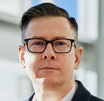 Alexander Hughes, executive leading a cryptocurrency trading platform