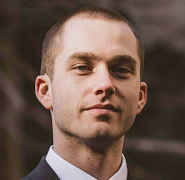 Crypto market specialist Thomas Whitfield posing as a trading analyst professional