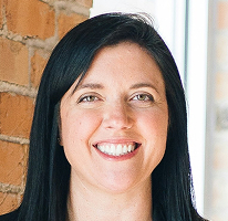 Sophie Hartwell heading the customer support team with portrait service focus
